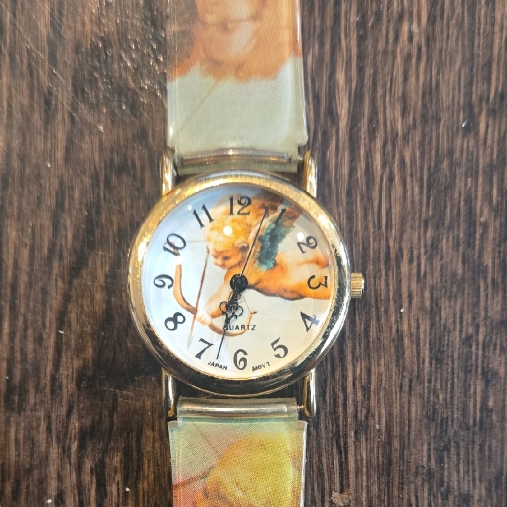 Vintage Angel Design Quartz Watch with Gold Accents
